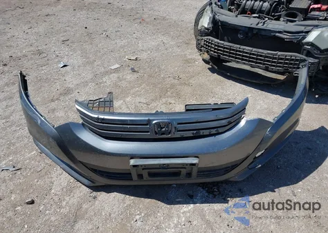 2010 Honda Insight Lx z USA, uszkodzony, nr VIN JHMZE2H58AS014625